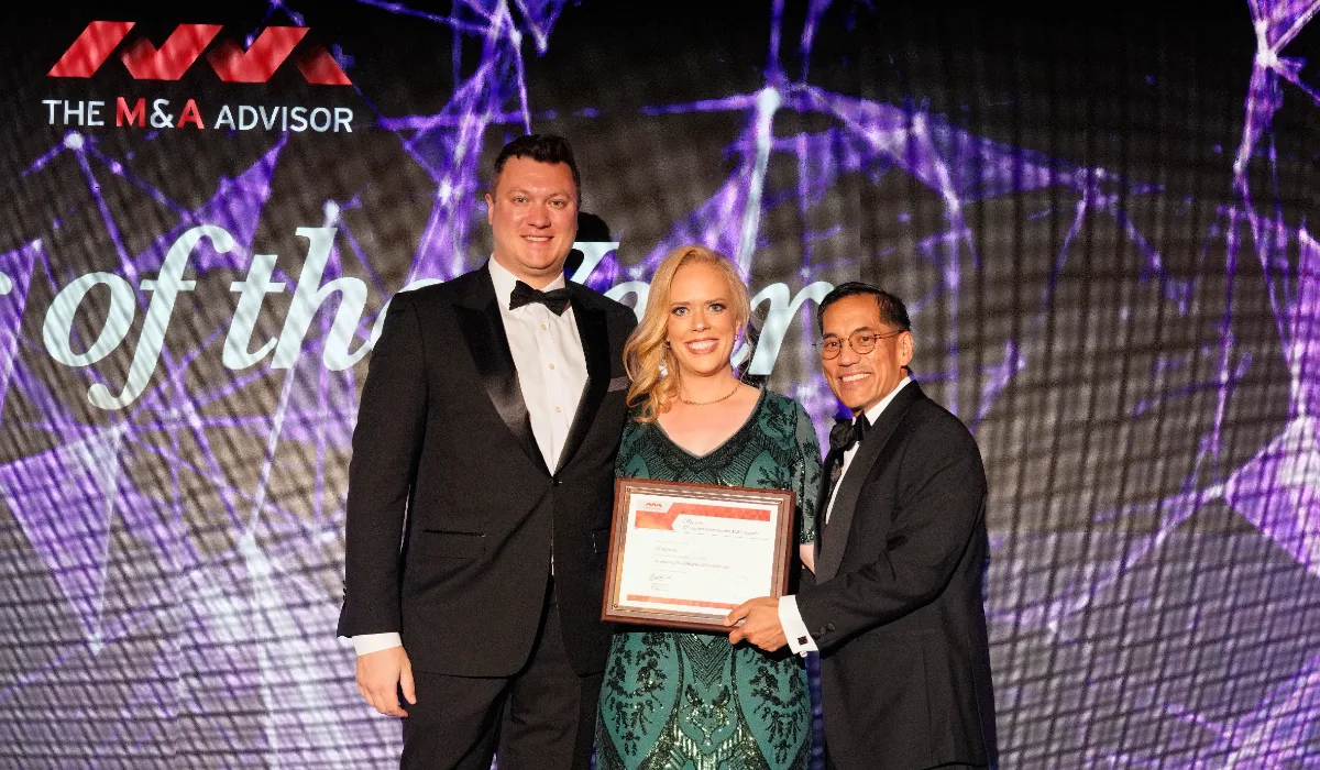 RingStone team accepting the Due Diligence Firm of the Year award at The M&A Advisor's 2026 Annual International M&A Awards.